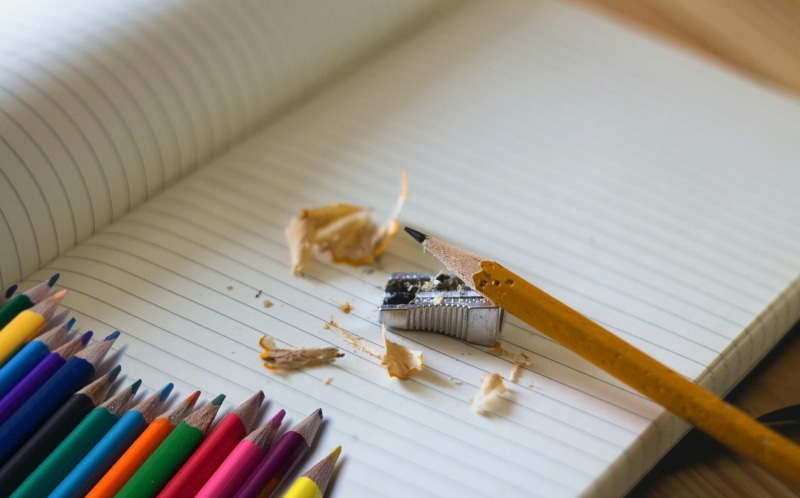 note pad, colored pencil, sharpener, no people, 2K, educate, still life, pencils, large group of objects, sharpening, indoors, pen, back to school, color