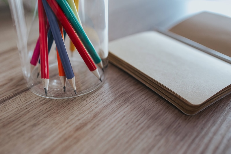 business, focus on foreground, journal, furniture, education, wood - material, notebook, still life, copy space, pencils, 4K, book, desk, choice, multi colored