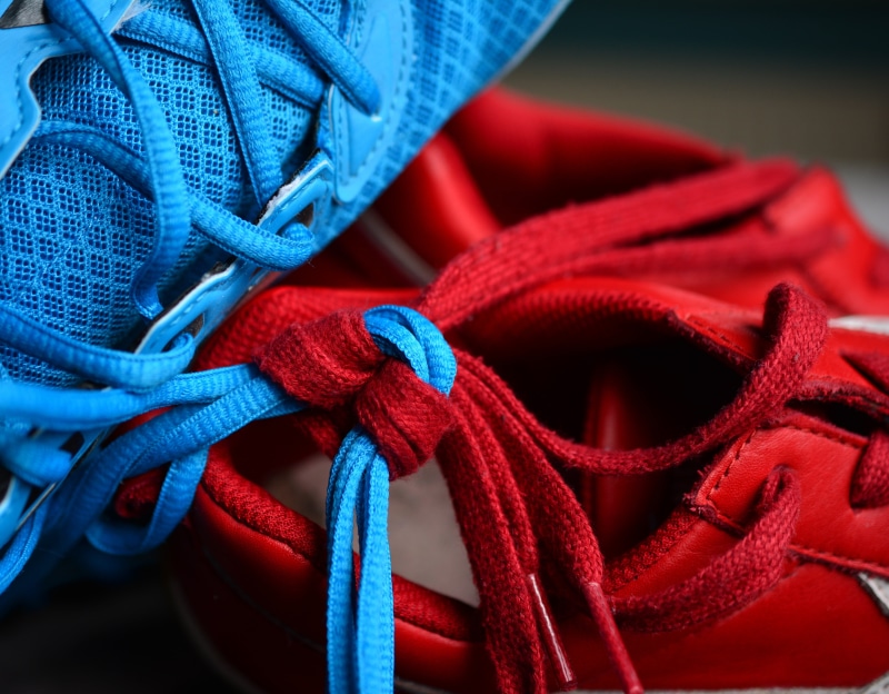 turquoise colored, no people, focus on foreground, red, close, tied, strength, bind, tangled, close-up, warm clothing, rope, pattern, lace, connection