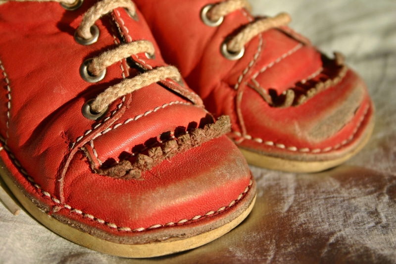 close-up, leather, memory, expired, fashion, textile, child, garment, footwear, no people, shoe, sport, red, old, first steps, lace - fastener, selective focus