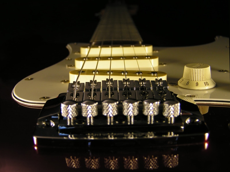 electric guitar, arts culture and entertainment, knob, no people, electric, day, music, close-up, event, string instrument, instrument, string, stratocaster