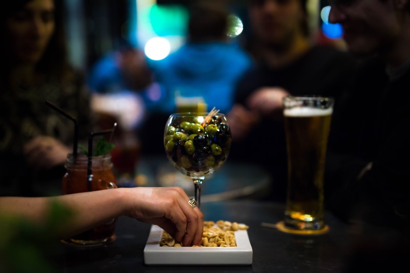 drinks, business, drink, wine glass, blur, hand, macro, refreshment, human body part, human hand, beverage, cocktail, holding, food and drink, focus on foreground