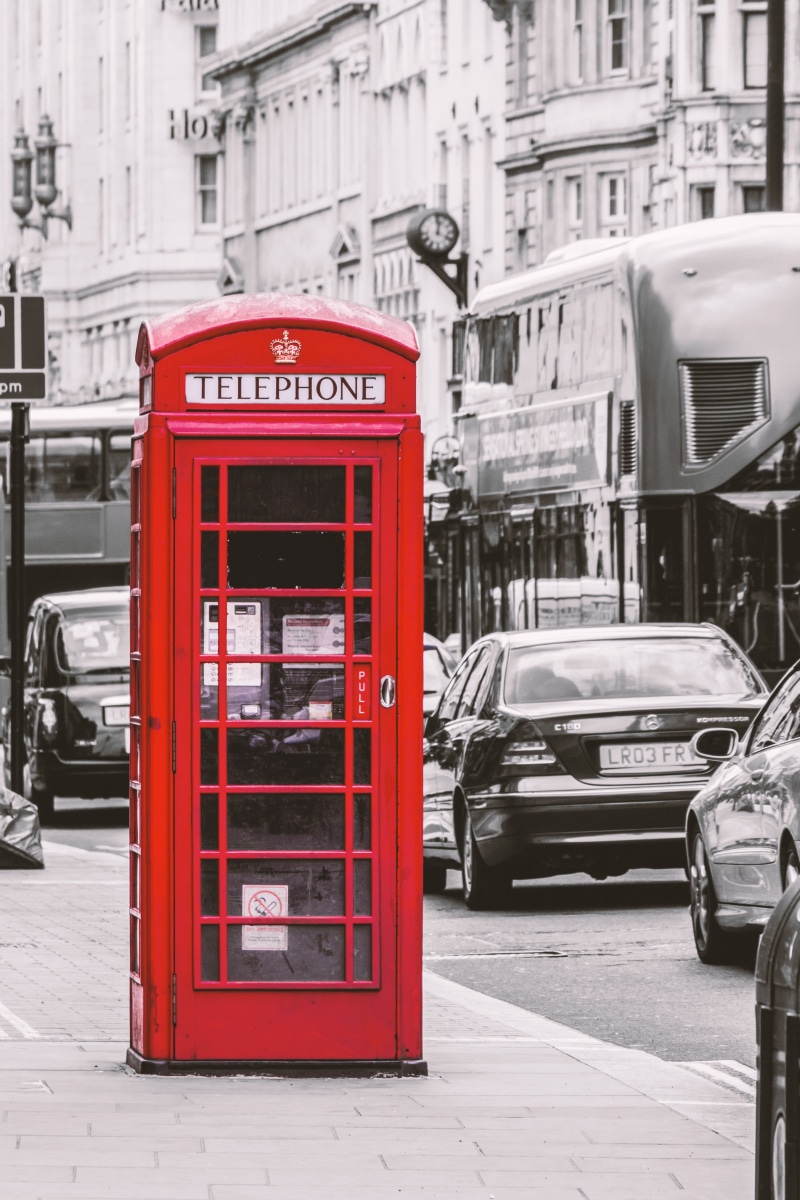 phone booth, western script, outdoors, telephone, red, public transportation, 5K, london, connection, dispensary, city life, road, architecture, built structure