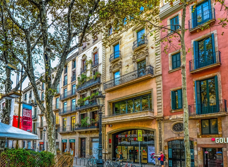 architecture, beige, shop, house, european, buildings, window, lamp post, catalonia, building, sign, low angle view, 2K, city, balcony, building exterior