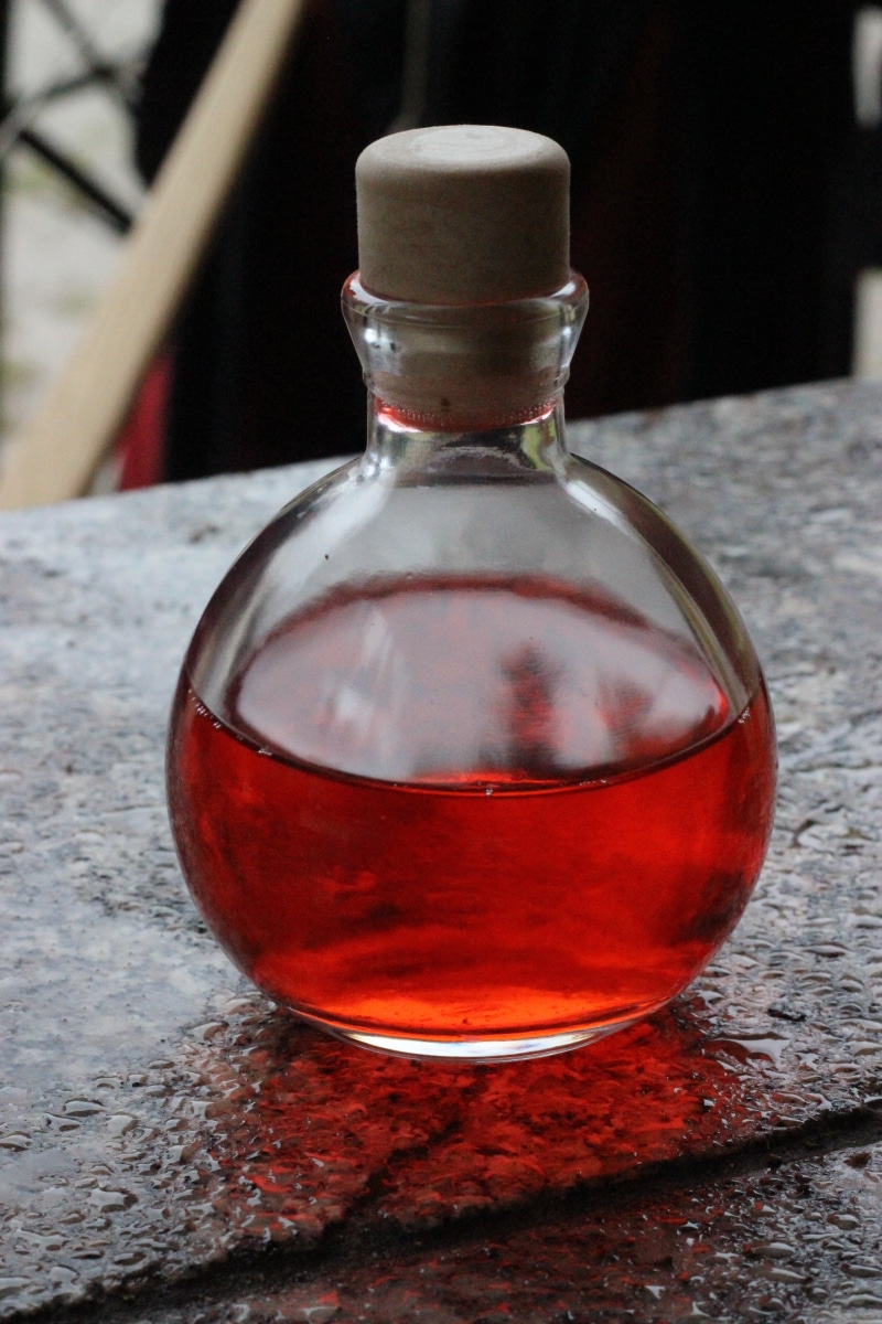 trunk, refreshment, cork, wood - material, 5K, close, potion, vial, indoors, single object, food and drink, magic potion, liquid, clear, still life, mystical