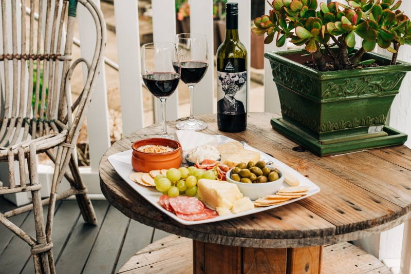 bottle, glasses, beer, top, table, veranda, home decor, healthy eating, freshness, wineglass, chair, refreshment, dips, glass, olives, furniture, red wine