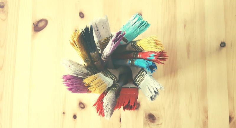 clear, close-up, blurred motion, still life, color, business, indoors, the art of, equipment, no people, surface, container, colored, paintbrush, hygiene