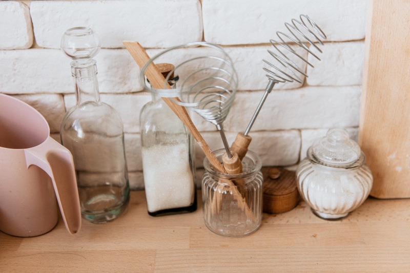 wood - material, plastic, group of objects, bottle, representation, light, pitcher, clear, natural, kitchenware, variation, shelf, jar, wood, close-up
