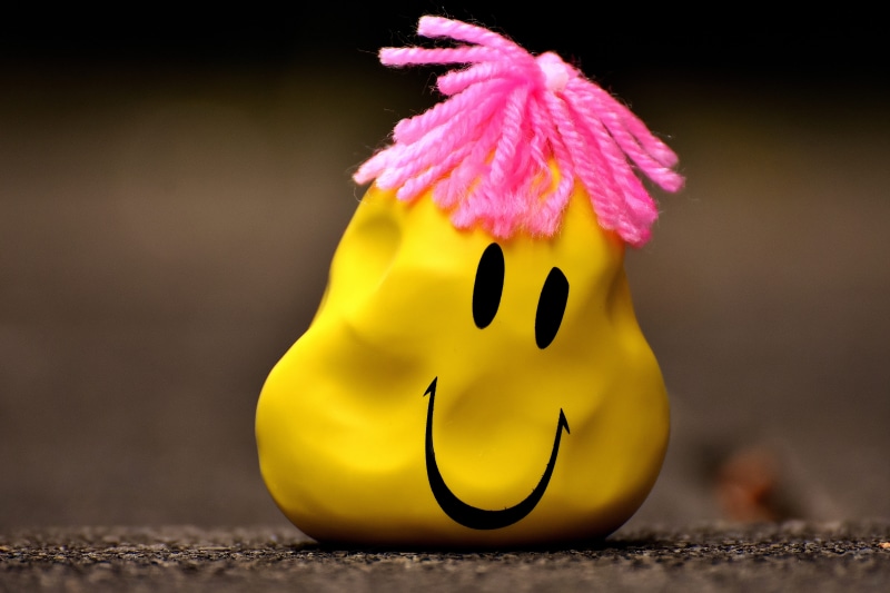 knead, celebration, pink, stress reduction, balloon, misshapen, human representation, Smiley, art and craft, day, focus on foreground, pink color, colorful