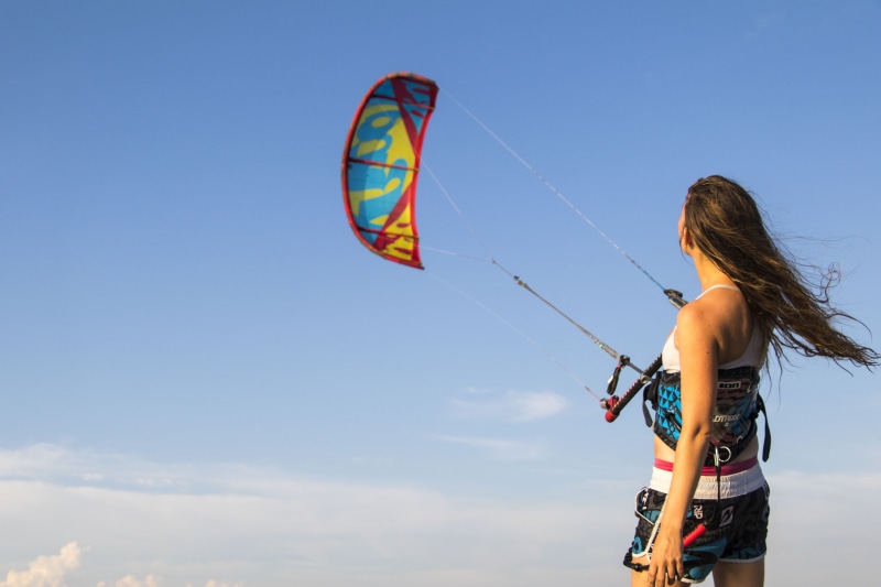 kiteboarding, day, summer, leisure activity, extreme Sports, wind, freedom, blue, kitesurfing, woman, standing, hairstyle, rear view, sky, paragliding