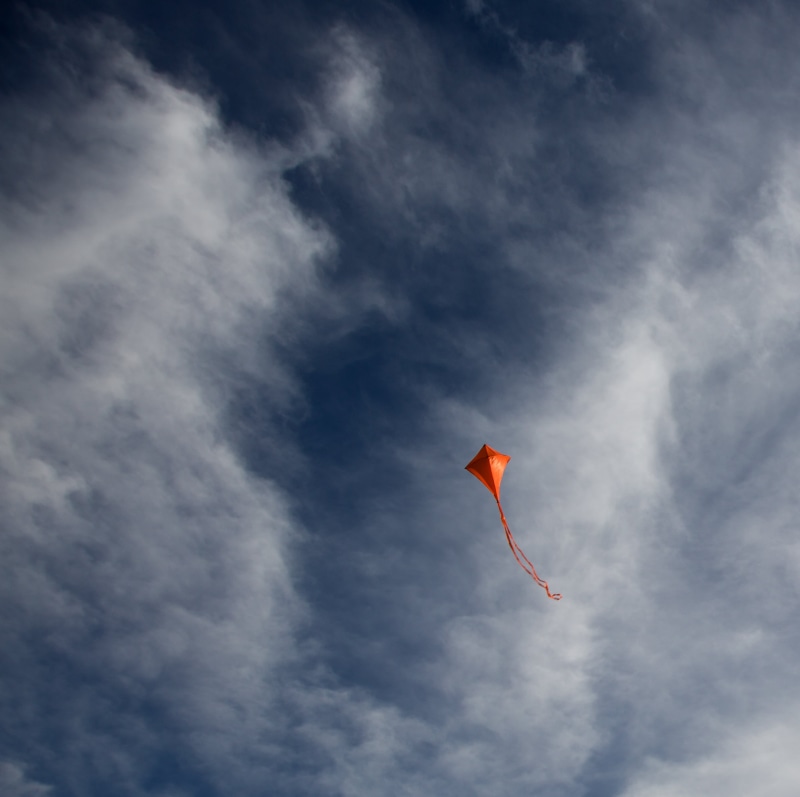 motion, flight, environment, mid-air, no people, outdoors, day, red, kite - toy, kite, 2K, freedom, wind, low angle view, nature, flying, sky, clouds