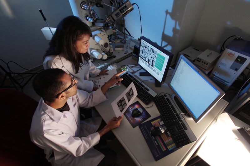 microbiology, mid adult, woman, working, scientific, computer equipment, indoors, computer, laboratory, man, connection, biotechnology, research, women