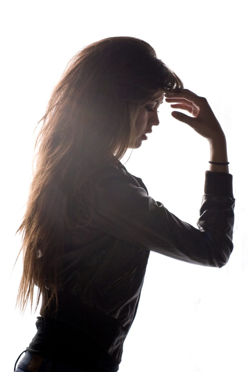 long, profile view, glamour, waist up, studio shot, one woman only, side view, jacket, female, real people, emotion, white background, beauty hair, hair