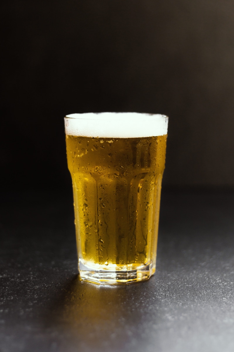 frothy Drink, drip, Summer, dark, clear, household equipment, filled, yellow, drinking Glass, bar counter, beer - Alcohol, light beer, bavarian, studio Shot
