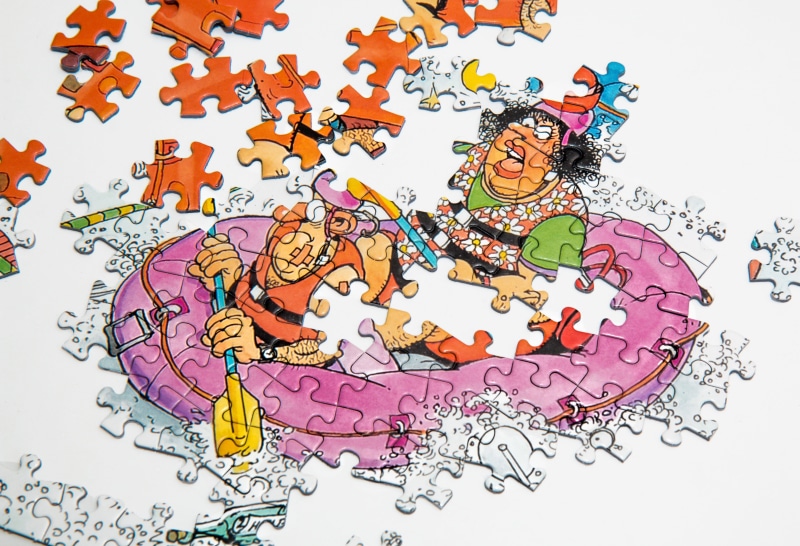 piece, western script, puzzle, text, multi colored, relaxation, problem, pieces, creativity, large group of objects, human representation, indoors, leisure