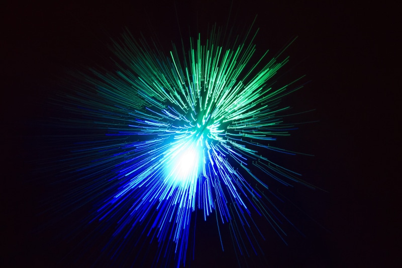 green, bright, illuminated, indoors, visual, celebration, arts culture and entertainment, night, exploding, studio shot, fireworks, vibrant color, black background
