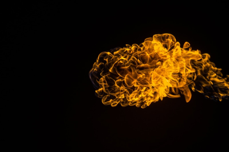energy, studio shot, cut out, warm, fire - Natural Phenomenon, black Color, dark, motion, heat - Temperature, backgrounds, sign, no people, yellow, inferno