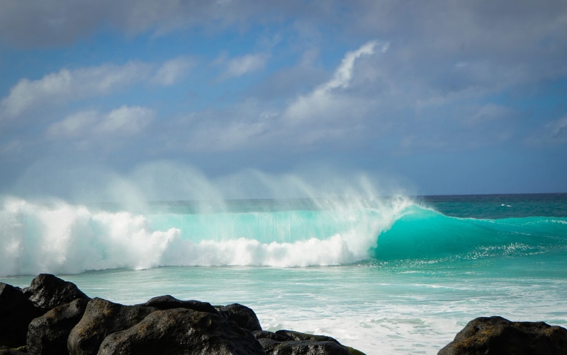 ocean, motion, no people, hitting, blue, clouds, breaking, united states, rocks, scenics - nature, banzai pipeline, land, boulders, horizon over water