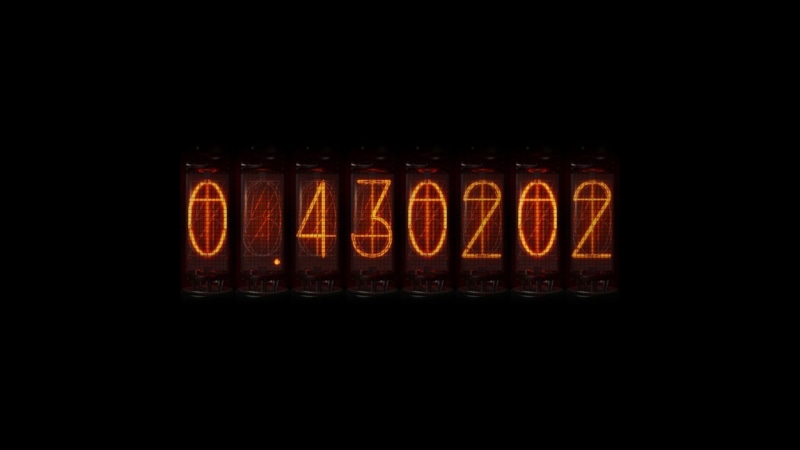 studio shot, western script, glowing, indoors, yellow, red, night, black background, text, no people, sign, communication, light - natural phenomenon, guidance