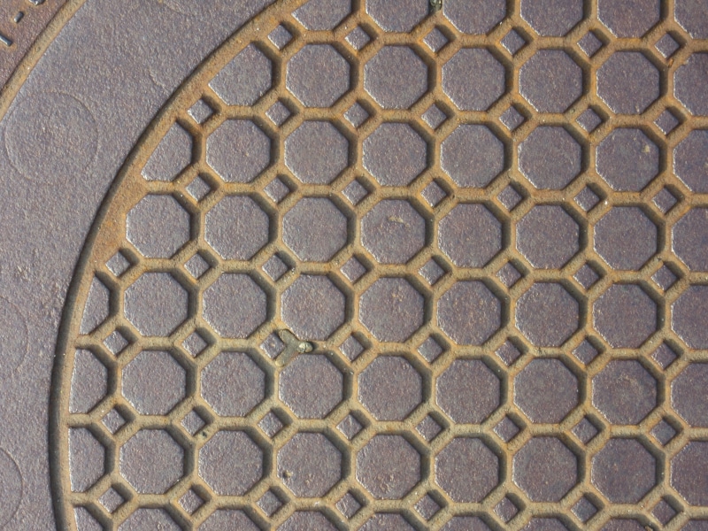 textured, pattern, manhole cover, texture, day, high angle view, design, close-up, food, circle, repetition, no people, background, hexagon, backgrounds