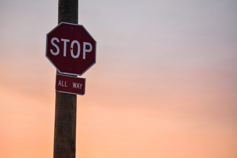 octagon, sign, text, golden hour, all way, traffic signs, capital letter, orange sky, information, outdoors, nature, communication, pink sky, clouds, no people