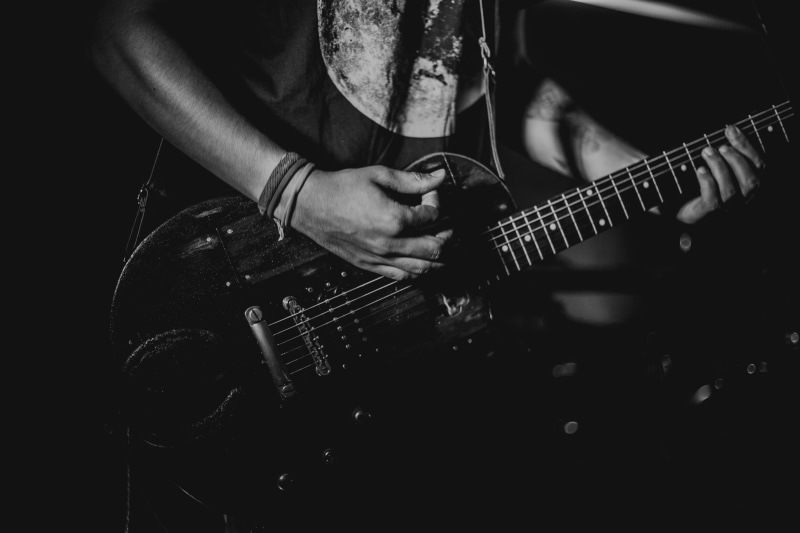 men, performance, bass Guitar, sound, real people, pop Musician, human Hand, photography, black And White, stage - Performance Space, entertainment occupation