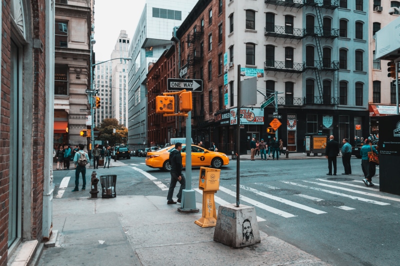 tourist attraction, pedestrian lane, sight, windows, vehicles, urban, motor vehicle, landscape, tourism, road, transportation, walking, day, sign, city life