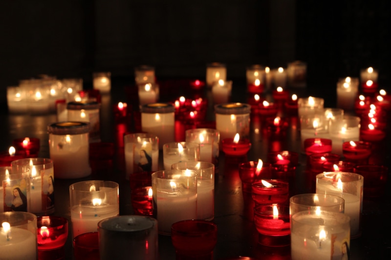 illuminated, wick, black background, nature, candles, lighted, formal wear, fire, heat - temperature, wax, lot, belief, light, burn, religion, beige, place of worship