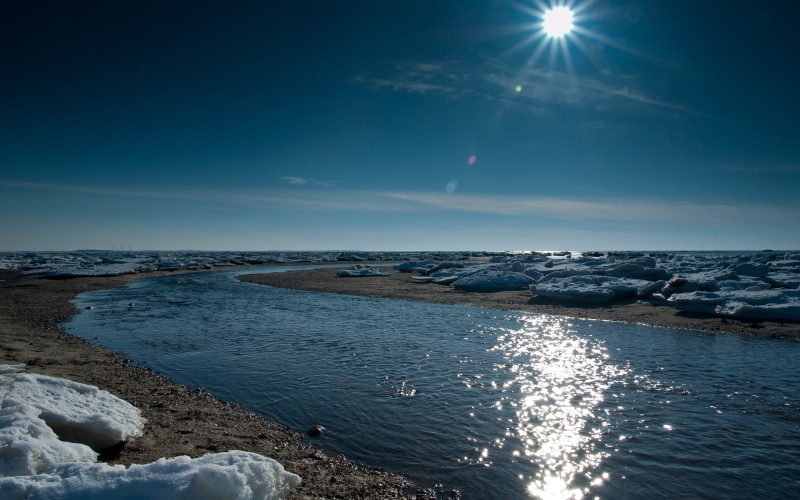 rock, no people, lens flare, scenics - nature, 2K, ice, tranquility, solid, river, sunlight, sky, outdoors, horizon over water, sea, beauty in nature