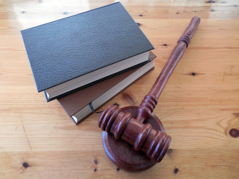 books, clause, 2K, retro styled, flooring, judge, personal accessory, court of justice, day, §, paragraphs, rule, high angle view, court, publication