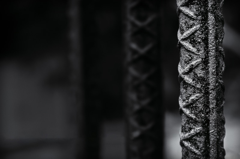 focus on foreground, selective focus, dark, strong, full frame, no people, copy space, protection, design, pattern, hanging, safety, wall - building feature