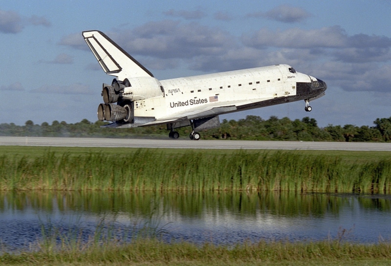lake, spaceship, runway, launch, orbit, airplane, travel, flying, plant, transportation, aerospace industry, tree, mode of transportation, aviation, space shuttle