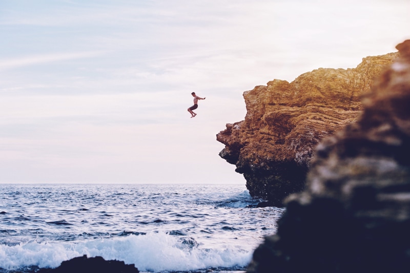 sky, 4K, land, solid, coastline, woman, day, scenics - nature, sport, daytime, beauty in nature, flying, body of water, nature, jumps, horizon over water