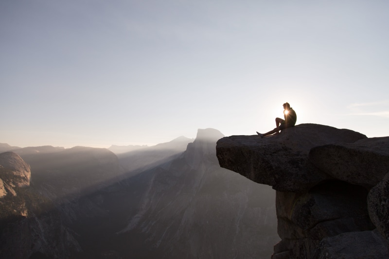 animals in the wild, nature, side view, top, high, peak, rock - object, looking at view, silhouette, standing, sunrise, man, day, full length, activity
