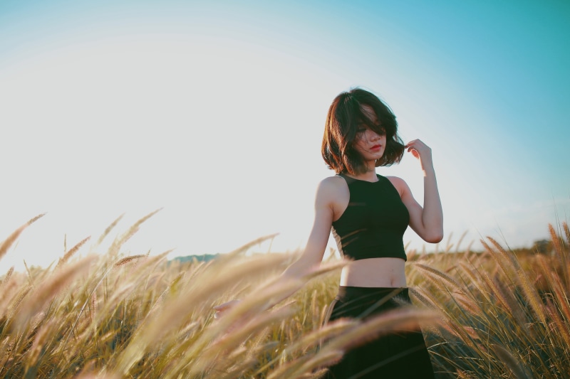 touching, straw, clear sky, one Person, woman, sky, exercising, nature, females, girl, caucasian Ethnicity, cereal plant, outdoors, three quarter length