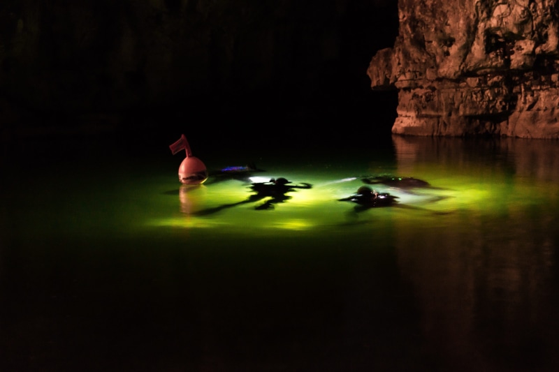 outdoors, nature, rock - object, torrent, night, leisure activity, solid, tranquility, activity, reflection, no people, water, rock, beauty in nature, scuba