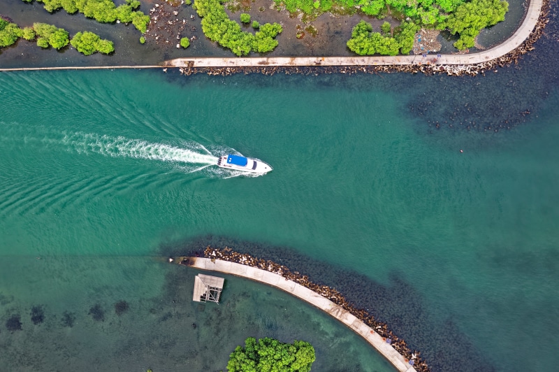 people, transportation, outdoors, from above, aerial view, lifestyles, boat, leisure activity, beach, aerial shot, day, 5K, turquoise colored, sea, high angle view
