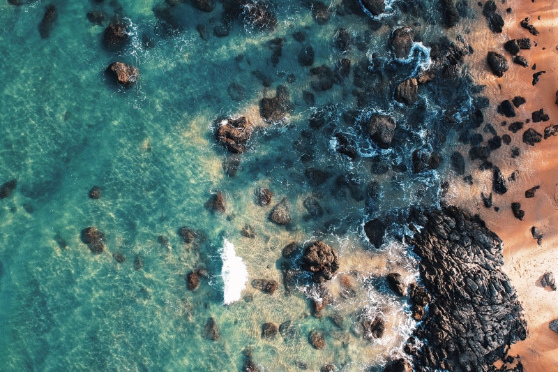 underwater, undersea, day, sea, from above, rocks, shore, photography, solid, outdoors, seashore, beauty in nature, beach, rock - object, water, no people