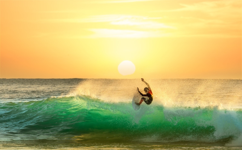 motion, men, sport, tropical, surfing, horizon over water, surfboard, water, one person, beauty in nature, waves, sky, nature, aquatic sport, adventure