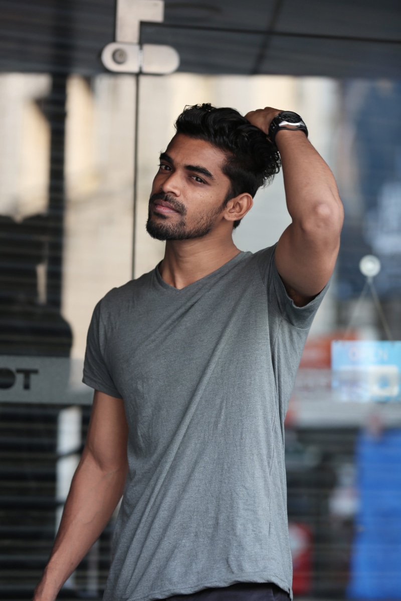 4K, beard, looking away, contemplation, wall - building feature, focus on foreground, young adult, grey, outdoor, real people, standing, man, looking