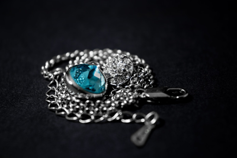 jewelry, black background, diamond ring, luxury, glamour, blue, precious gem, indoors, diamond, selective focus, 5K, design, expense, bracelet, studio shot