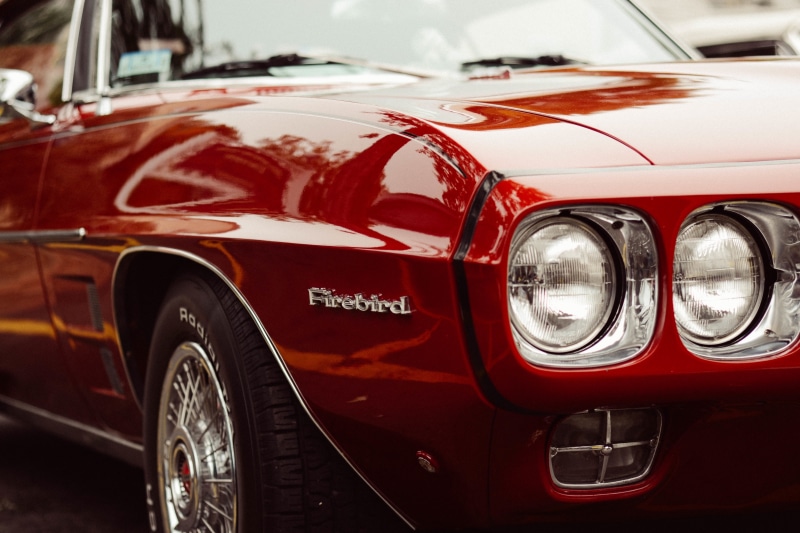 restoring, tire, bumper, headlight, convertible, transportation, classic, vintage Car, luxury, motor vehicle, reflection, focus on foreground, pontiac firebird