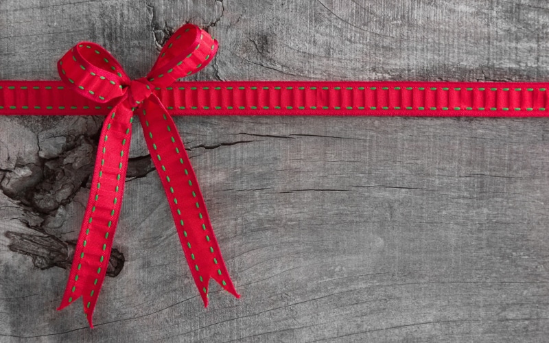 celebration, no people, gift, table, christmas, 2K, ribbon, tied bow, gift box, ribbon - sewing item, indoors, tied knot, red, high angle view, close-up