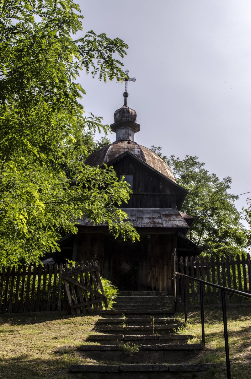 prayer, the altar, banners, place of worship, no people, church, the window, grass, tree, mass, the bell tower, the priest, building exterior, fresco, day