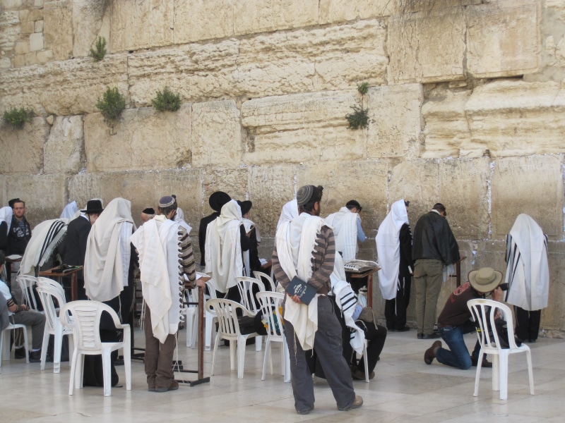 jewish, built structure, chair, judaism, beside, wall - building feature, ancient, religious, outdoors, pray, stone wall, large group of people, religion
