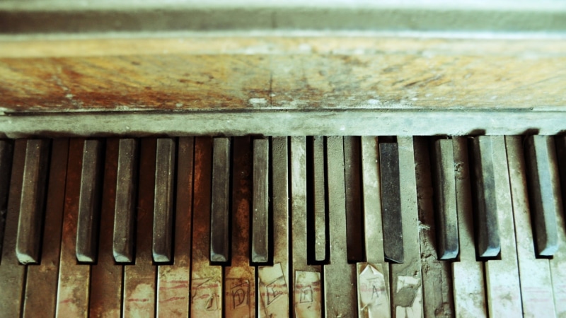no people, side by side, in a row, focus on foreground, texture, still life, bad condition, weathered, spinet, close-up, piano, run-down, musical equipment