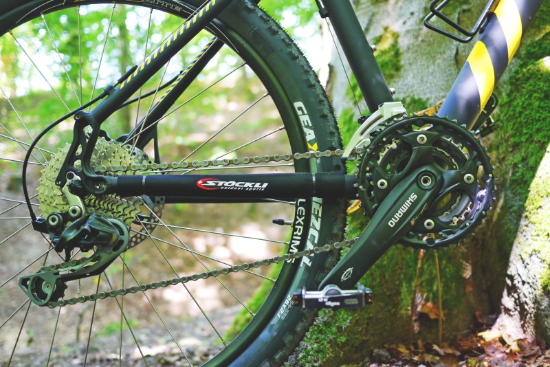 pedal, spokes, fitness, wheel, bicycle, leisure, cycle, recovery, away, outdoor, green color, sport, black, spoke, parking, path, stationary, transportation