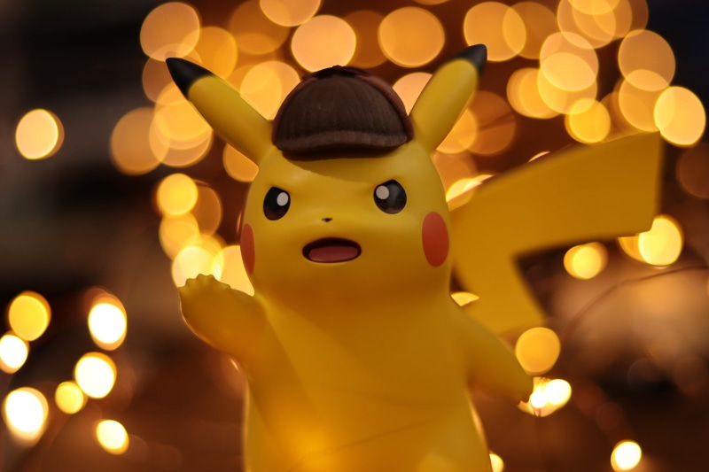 2K, illuminated, night, light, pikachu pokémon, focus on foreground, defocused, close-up, close, lighting equipment, pikachu, portrait, one person, indoors