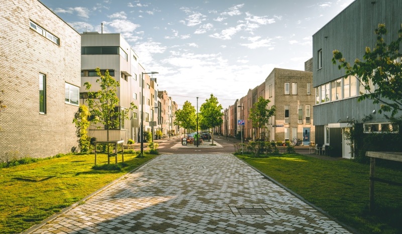 residential district, street, cloud - sky, vegetation, transportation, car, condo, nature, architecture, city, the way forward, town, mode of transportation