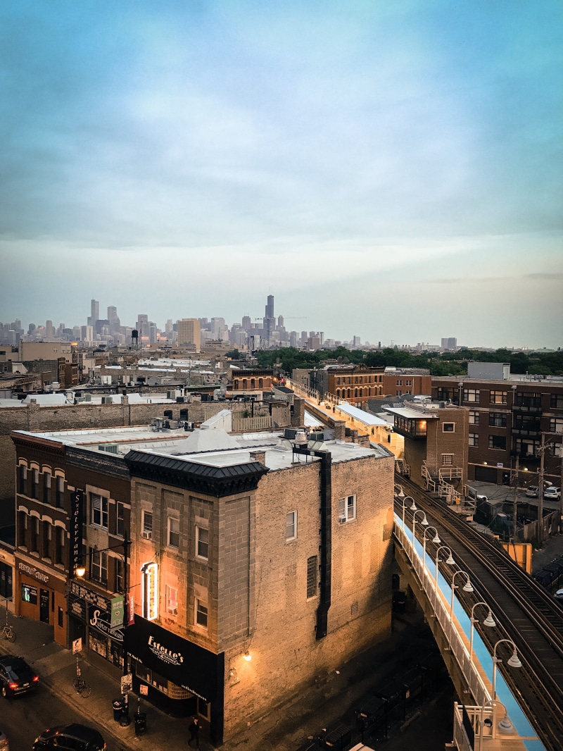 cloud - sky, high angle view, street, summer, rail transportation, city, skyscraper, cloudy, office building exterior, chicago, outdoors, mode of transportation